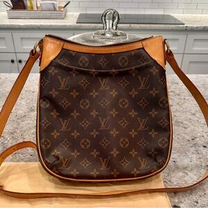 Authentic Louis Vuitton Odeon PM. Date code CA2121.